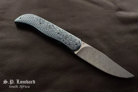 Hand made folding knife by Fanie Lombard