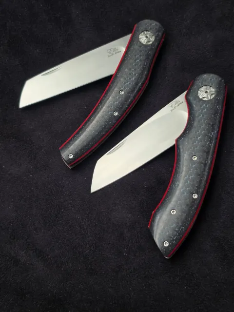 Falcon and Dolphin double detent Folders by Johan Ellis