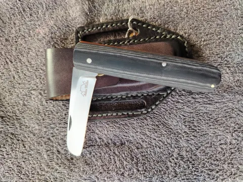 Slipback folder by Kobus Miller