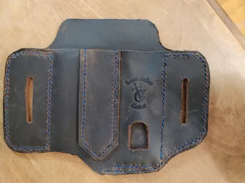 Leather belt organisers by Theunis Coetzee
