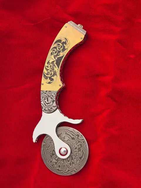 Custom Pizza cutter by Van van der Merwe